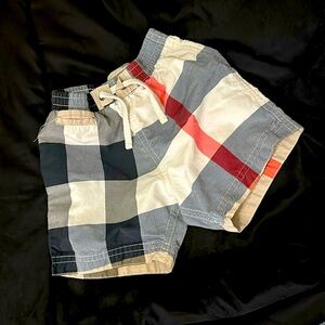Size 9months , gently used Burberry swim trunks
